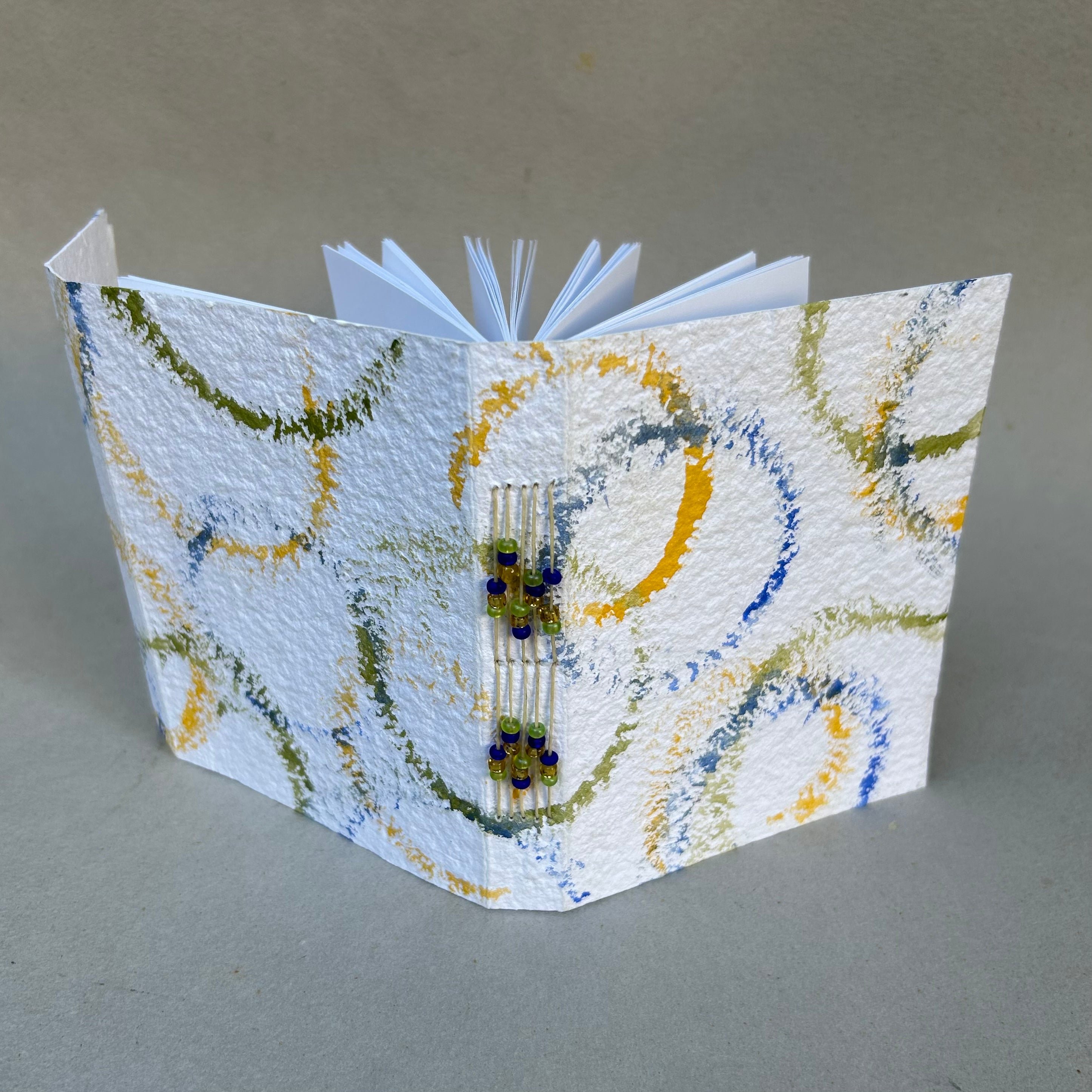 Sewn Journal with Exposed Stitching and Beads image 1